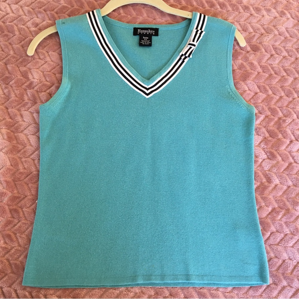 Teal blue sweater vest with ribbon accent